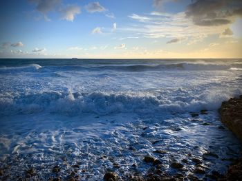 Scenic view of sea against sky during sunset