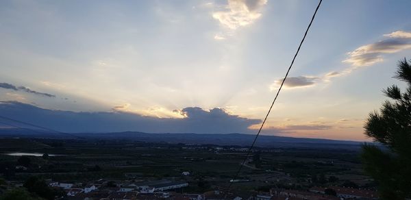 Scenic view of mountains against sky during sunset