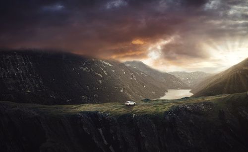 Scenic view of mountains against sky during sunset