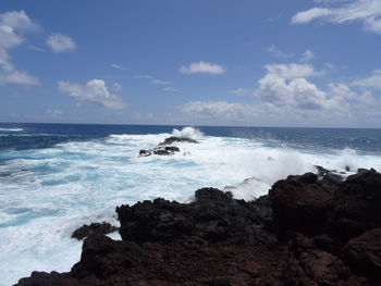 Waves splashing on rocks