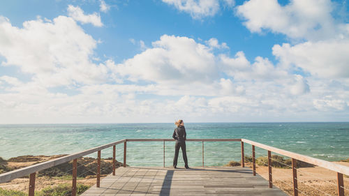 Woman standing on beach