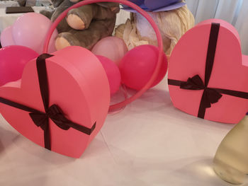 High angle view of balloons tied on paper