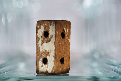 Close-up of rusty ring by sea