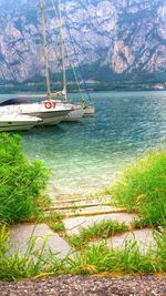 Boats in calm lake