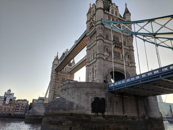 Low angle view of london bridge against sky