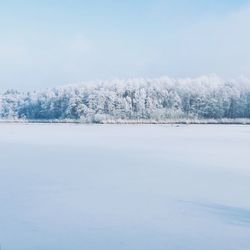 Scenic view of frozen lake against sky