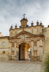 View of historic building against cloudy sky