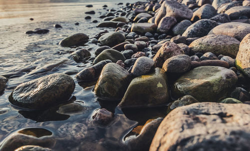 Close-up of stones on beach