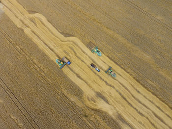 High angle view of tractors on field