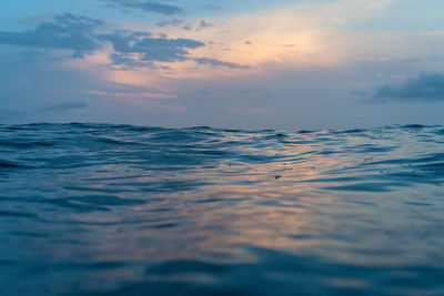 Scenic view of sea against sky at sunset