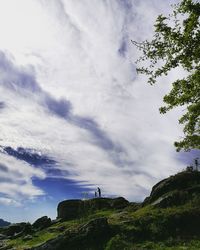 Scenic view of golf course against sky