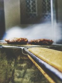 Close-up of meat on barbecue grill