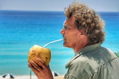 Close-up of man in summer vacations