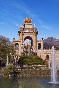 View of fountain against blue sky