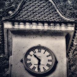 Old-fashioned clock on wall