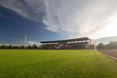 Scenic view of soccer field against sky