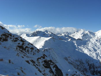 Scenic view of snow covered mountains