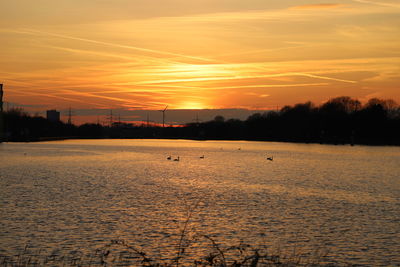 Scenic view of silhouette landscape against sky during sunset