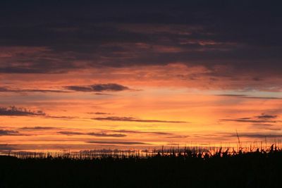 Scenic view of silhouette landscape against sky during sunset