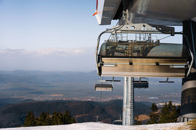 Close-up of ski lift in mountains in winter