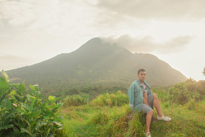 Full length of man on mountains against sky