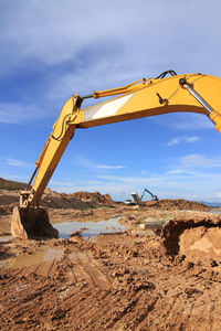 Construction site on field against sky