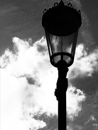 Low angle view of street light against sky