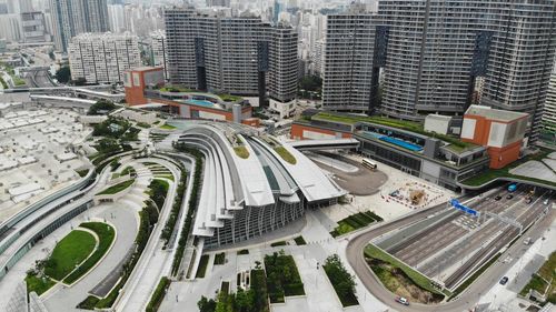 High angle view of street amidst buildings in city