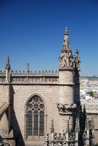 Exterior of historic building against blue sky