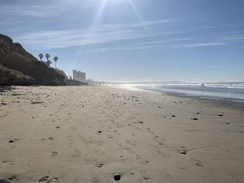 Scenic view of beach against sky