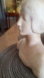 High angle view of female statue at store