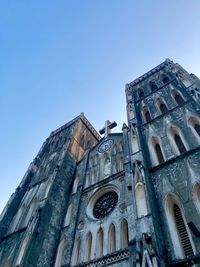 Low angle view of cathedral against blue sky