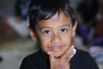 Close-up portrait of smiling boy