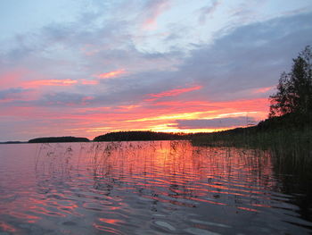 Sunset over calm lake