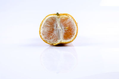 Close-up of apple against white background