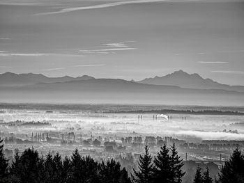 Scenic view of silhouette mountains against sky