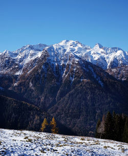 A gravel bike around the dolomites, bike path, ciclying and mountain bike, first snow on the path