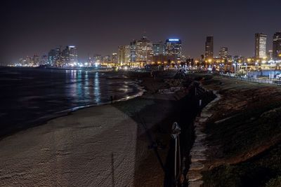 View of city lit up at night