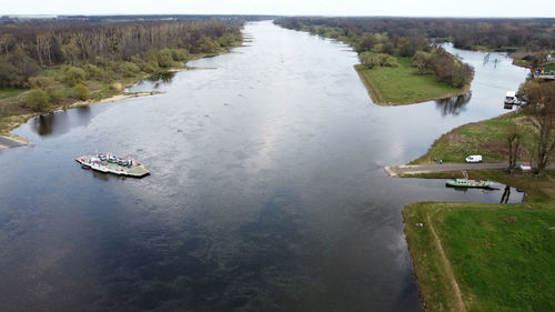 High angle view of river amidst grass