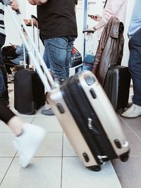 Low section of people standing on railroad track
