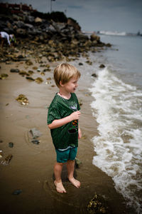 Full length of boy on beach