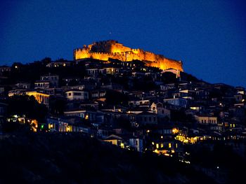 View of illuminated city at night