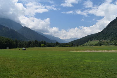 Scenic view of field against sky