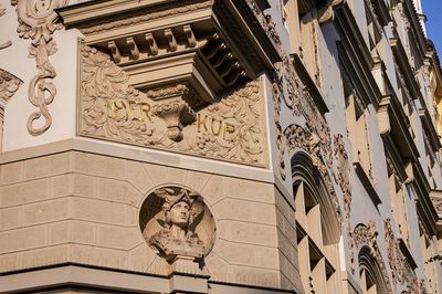 Low angle view of sculptures on building