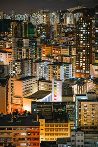 Illuminated buildings in city at night