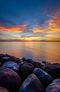 Scenic view of sea against sky during sunset