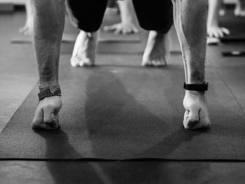 Low section of man exercising in gym