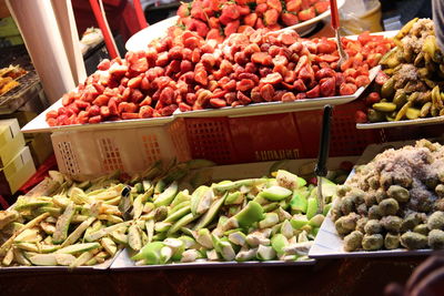 Variety of fruits seasoned at food street