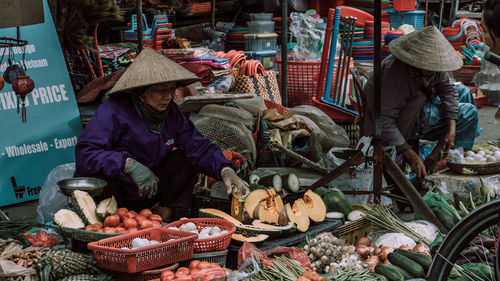 People at market stall