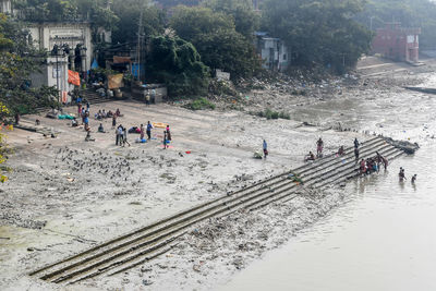 High angle view of people on city buildings